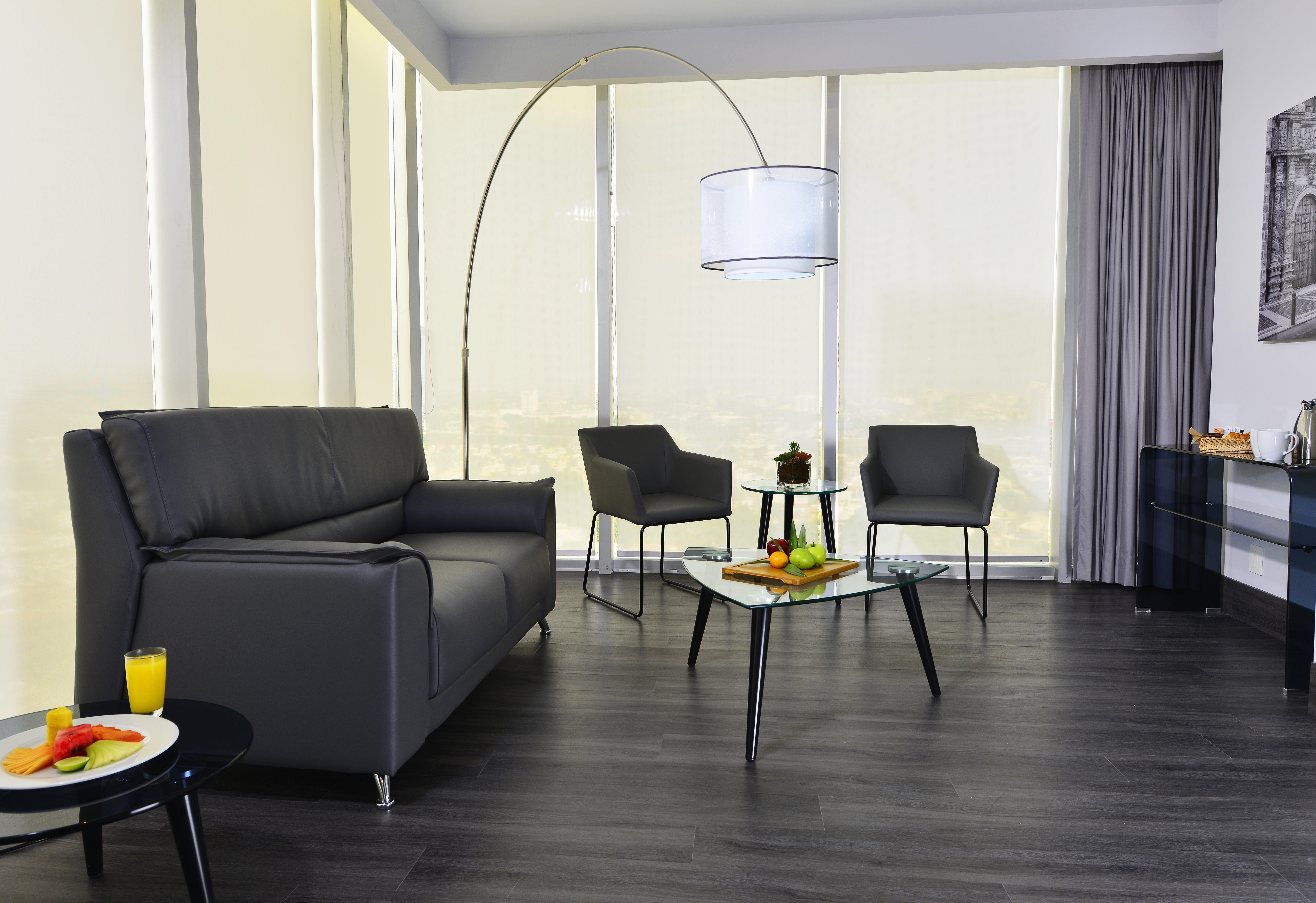 Baruk Guadalajara Hotel de Autor Exterior foto A living room with a floor lamp